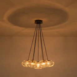 Black 7-Light Cluster Clear Glass Oval Globe Chandelier