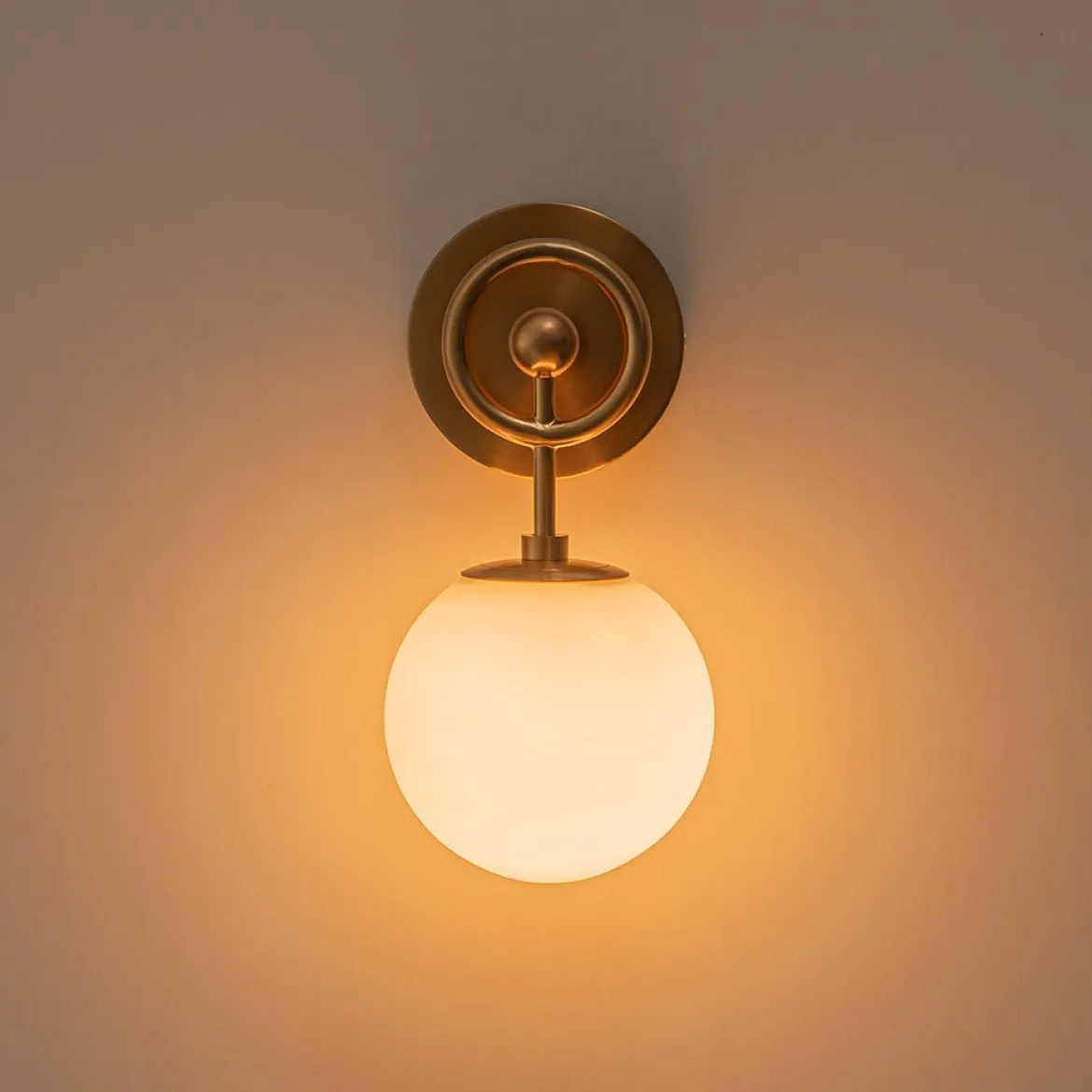 Mid-Century 1-Light Opal Glass Globe Armed Vanity Wall Sconce