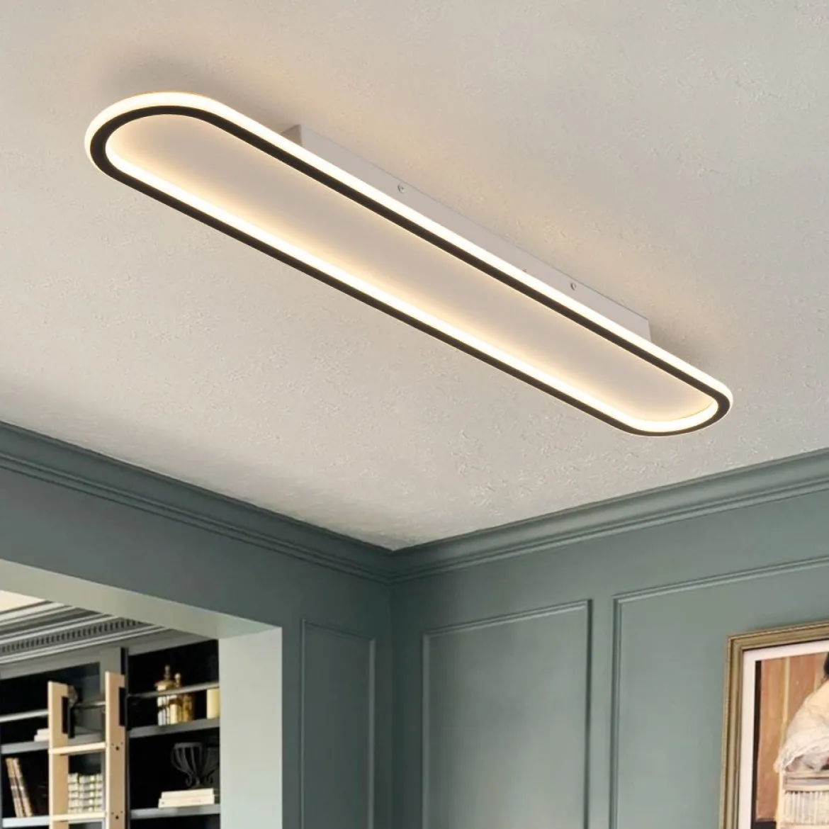 Minimalist Streamlined Oval Warm LED Ceiling Light